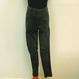 Black leggings with gold zip ankle